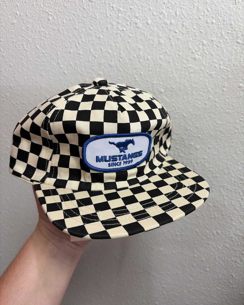 black checkered blue patch cap