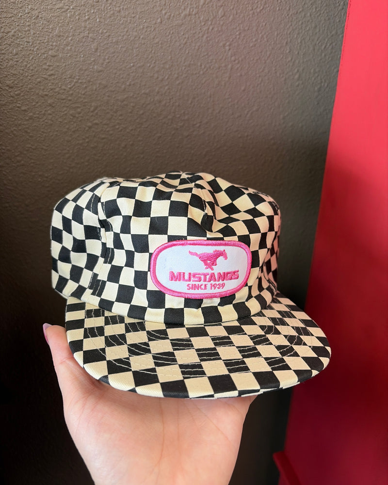 black checkered with pink patch