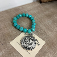 Buffalo coin with turquoise beads ￼