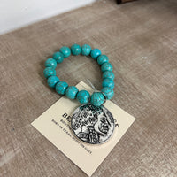 Buffalo coin with turquoise beads ￼